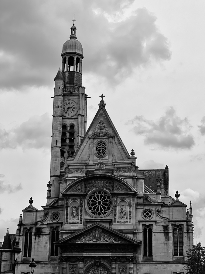 A church tower under grey sky